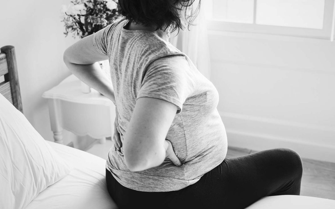 Comment soigner le mal de dos (lombalgie) de la femme enceinte avec l’ostéopathie ?